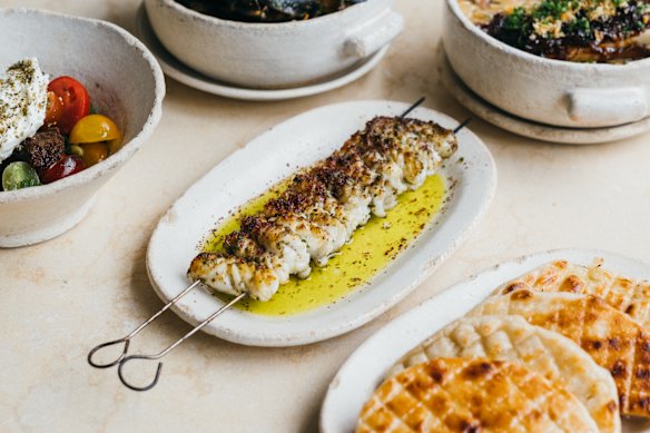 Charred squid skewer with confit garlic and zaatar at Oma in Borough Market