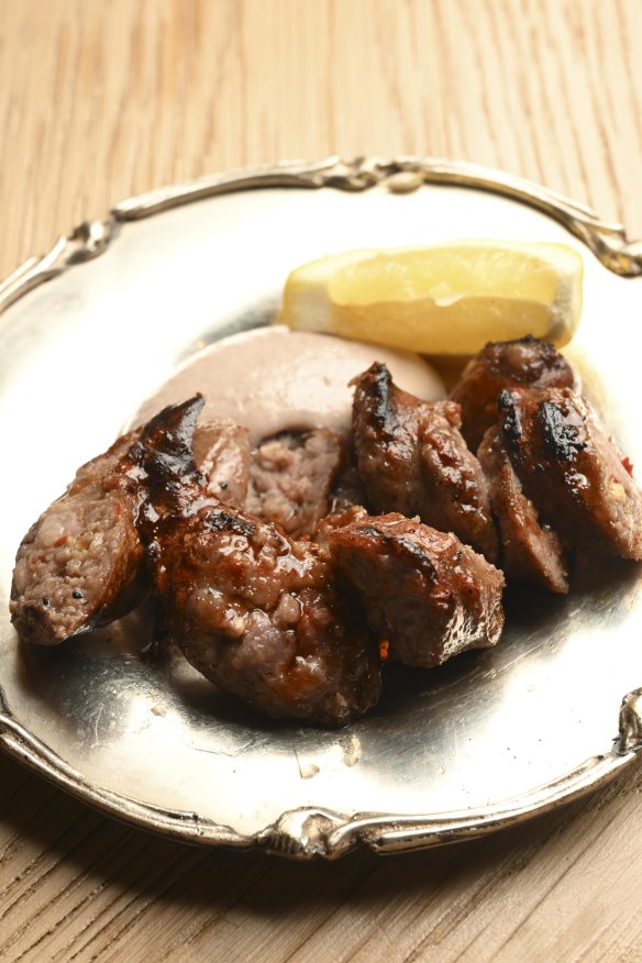 Loukaniko sausage with hot honey and walnuts.