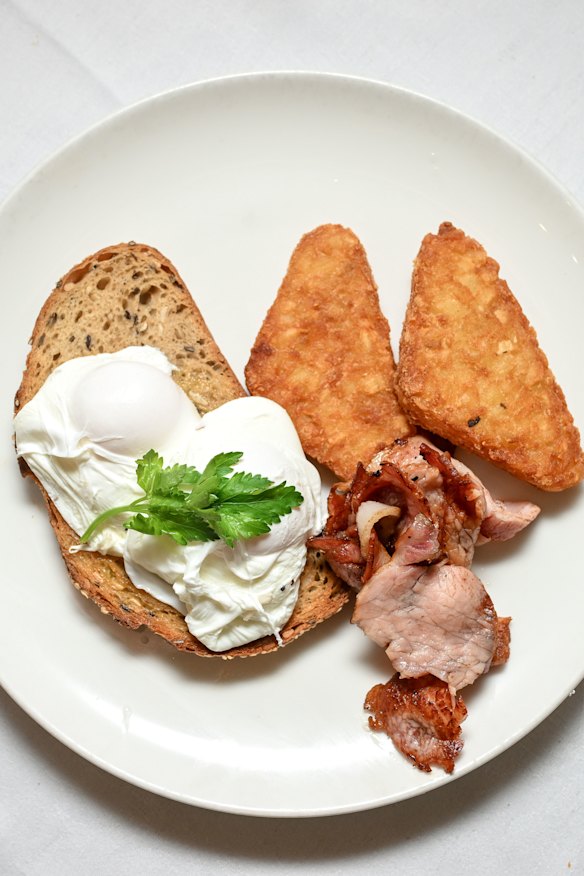 Bacon, eggs, hash browns and toast.
