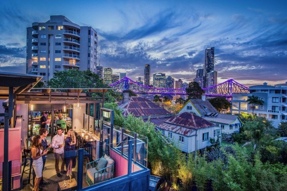 Spicers Balfour’s rooftop bar has views of the surrounding suburb, with the Story Bridge and CBD in the distance.