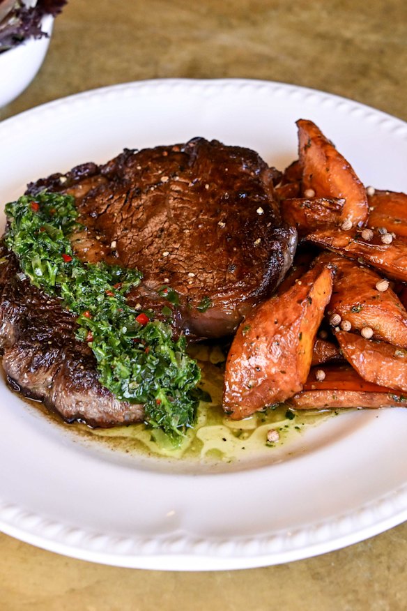 Scotch fillet with chimichurri and roasted buttered carrots.
