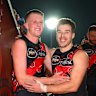 MELBOURNE, AUSTRALIA - MAY 23: Angus Clarke of the Bombers celebrates his first game and win with Zach Merrett after the round 11 AFL match between Essendon Bombers and Richmond Tigers at Melbourne Cricket Ground, on May 23, 2025, in Melbourne, Australia. (Photo by Quinn Rooney/Getty Images)