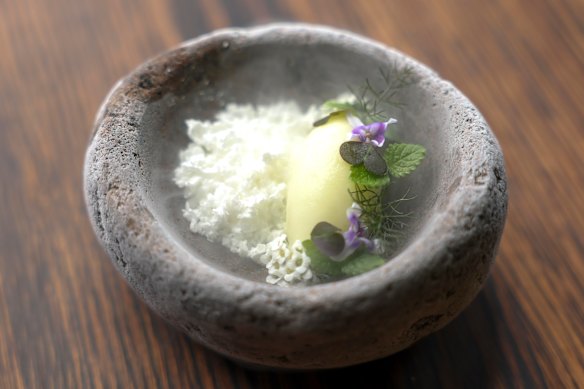 Apple sorbet served tableside with dry-ice smoke.