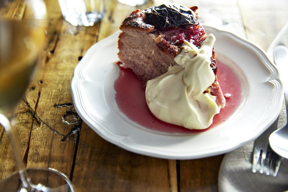 Rum baba cake with plum.