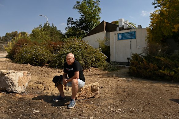 Australian Israeli Geoffrey “Danny” Majzner in front of his sister Galit Carbone’s home, where she was killed by Hamas during the October 7 attack on Kibbutz Be’eri. Majzner was a few streets away, sheltering in his safe room from 7am until 3am the next day.