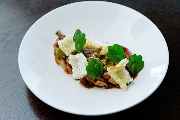 Dry-aged Berkshire pork tomahawk with a retro chilli-honey-soy sauce.