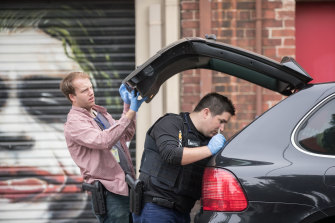 Police raid a property on Lalor St, Port Melbourne on Wednesday morning.