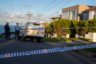 A woman is fighting for her life after she was stabbed by a man who came to her door on Monday. 