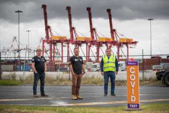 Union leaders Robert Lumsden, David Ball and Matt Purcell at Melbourne docks on Wednesday.