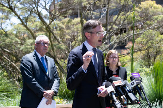NSW Premier Dominic Perrottet  (centre), with Health Minister Brad Hazzard and Chief Health Officer Kerry Chant on Wednesday.