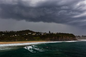 Storms and rains swept into Sydney on Tuesday afternoon, including into Newport (pictured)