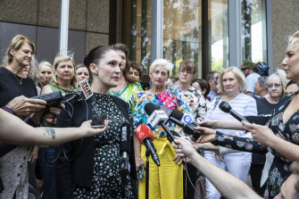  Shine Lawyers’ Rebecca Jancauskas standing with a group of women who were involved in the class action after the court win in 2019.