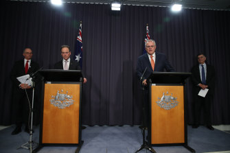Chief Medical Officer Professor Paul Kelly, Health Minister Greg Hunt, Prime Minister Scott Morrison and Health Department secretary Professor Brendan Murphy announced the new advice on Thursday night.