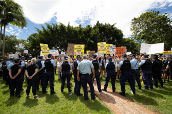 Protesters at Lismore Council Chambers wait for the Prime Minister to arrive. 