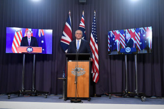 Scott Morrison, British PM Boris Johnson and US President Joe Biden announce the AUKUS pact in September.
