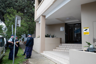 Police at the apartment complex in Bondi on Thursday morning. 