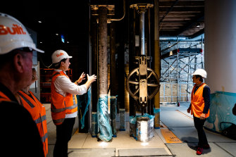 At a tour of SubStation No.164, the lord mayor Clover Moore and the developmental director of Built Jono Cottee talk about the potential for the old machine hall to become a place for events or concerts. 