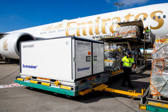 The first vials of the AstraZeneca COVID-19 vaccine arriving at Sydney Airport on Sunday morning.