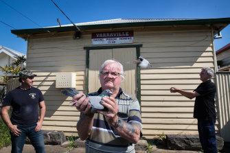 Yarraville Racing Pigeon Club secretary Les Staehr, centre, with assistant secretary Matty Ciancio, left, and president John Saggers, right.