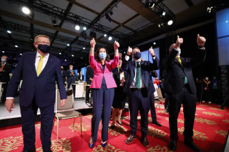 Members of the Brisbane 2032 delegation, from left, John Coates AC, President, Australian Olympic Committee, The Honourable Queensland Premier Annastacia Palaszczuk., Lord Mayor Adrian Schrinner, and Federal Sports and Aged Care Minister Senator Richard Colbeck  celebrate in Tokyo in Julyb 2021 as Queensland is named host state for the 2032 Games.
