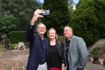 Anthony Albanese takes a selfie in Wyong on Saturday with Sharon Brownlee and Bruce Davis, from Coast Community Connections.