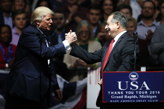 Then US president Donald Trump with Andrew Liveris at a rally in 2016. Liveris had helped write manufacturing policy for Barack Obama and Trump, and a similar outcome was arguably possible in Australia.