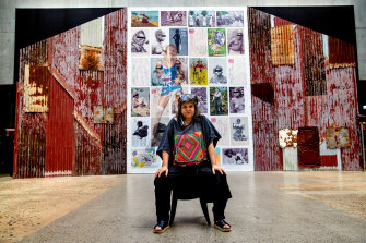 Karla Dickens with part of her monumental work, Return to Sender, at Carriageworks.
