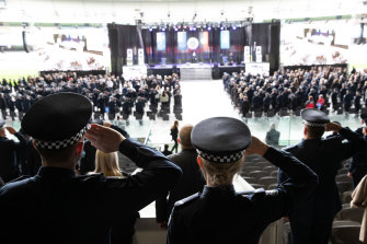 Members of Victoria Police honour four colleagues who lost their lives in the Eastern Freeway tragedy in 2020 at a state memorial service at Marvel Stadium on Thursday.