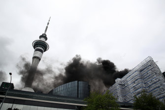 Smoke is seen coming from Auckland's SkyCity Convention Centre after a fire broke out on the roof.