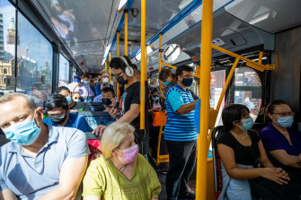 A packed bus heads west away from the CBD on Monday afternoon.