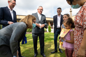 Premier Dominic Perrottet, Health Minister Brad Hazzard and Chief Health Officer Dr Kerry Chant talking to children that have received the vaccine before school starts.
