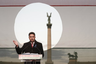Hungarian opposition candidate Peter Marki-Zay addresses supporters during celebration the 65th anniversary of the 1956 Hungarian revolution, in Budapest, Hungary. Russian tanks put down the revolution. 