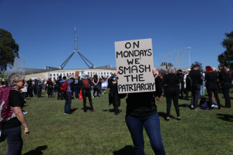 “On Mondays we smash the patriarchy”: Crowds in Canberra have gathered near Parliament House.