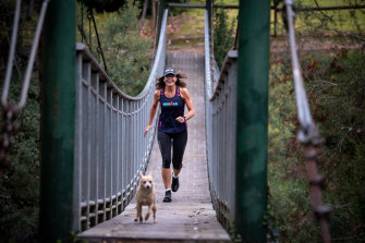 Good day for a run: Rosie Spicer braves the cold to train in Porepunkah with her dog, Noah.