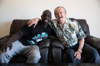 Mariners star Ruon Tongyik and his 82-year-old neighbour, Remo Pertot.