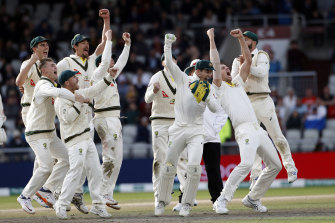 How sweet it is: Australia celebrate retaining the Ashes at Old Trafford.