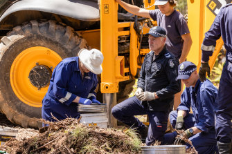 Experts dig through soil as the search for missing campers Russell Hill and Carol Clay enters its second day.