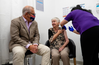 Jane Malysiak, then 84, was the first  Australian to receive a COVID-19 vaccination back in February, on the same day as Prime Minister Scott Morrison (left).
