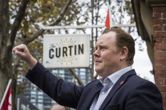 Victorian Trades Hall Council secretary Luke Hilakari outside the John Curtin Hotel on Friday, explaining why unions have called their “green ban” on any redevelopment of the venue.