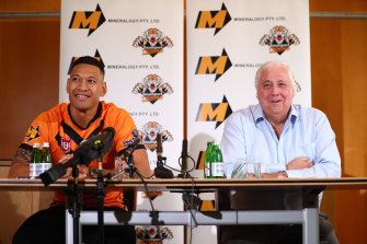 Israel Folau and Clive Palmer in May this year.