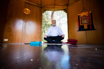Father John Dupuche in one of the ashram’s meditation huts.