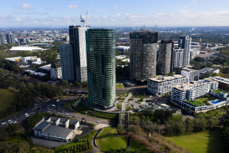 Opal Tower, in the foreground, was evacuated on Christmas Eve 2018 after cracks were found in the building.