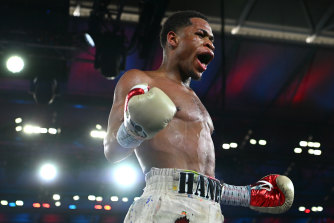 Devin Haney celebrates his win.