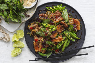 Stir-fried pork belly with chillies and sugar snap peas.