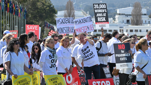 Several hundred pharmacists protest outside Parliament House on Monday.