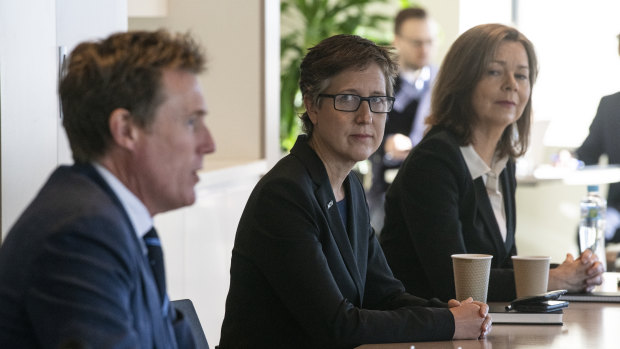 Industrial Relations Minister Christian Porter (left) and ACTU secretary Sally McManus (centre) at a meeting of the industrial relations working groups.