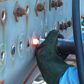 Hot rivetting on the John Oxley bulwarks.