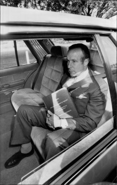 Sir Laurence Street arrives at Government House with the report of the Wran Royal commission on July 28, 1983.