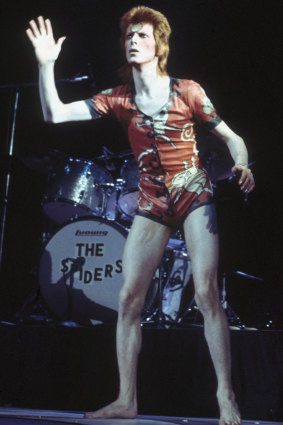David Bowie performing as Ziggy Stardust, in his 'woodland creatures' costume designed by Kansai Yamamoto, at the Hammersmith Odeon, 1973. 