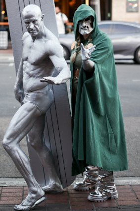 Fans dressed as Silver Surfer and Doctor Doom at San Diego’s Comic-Con.